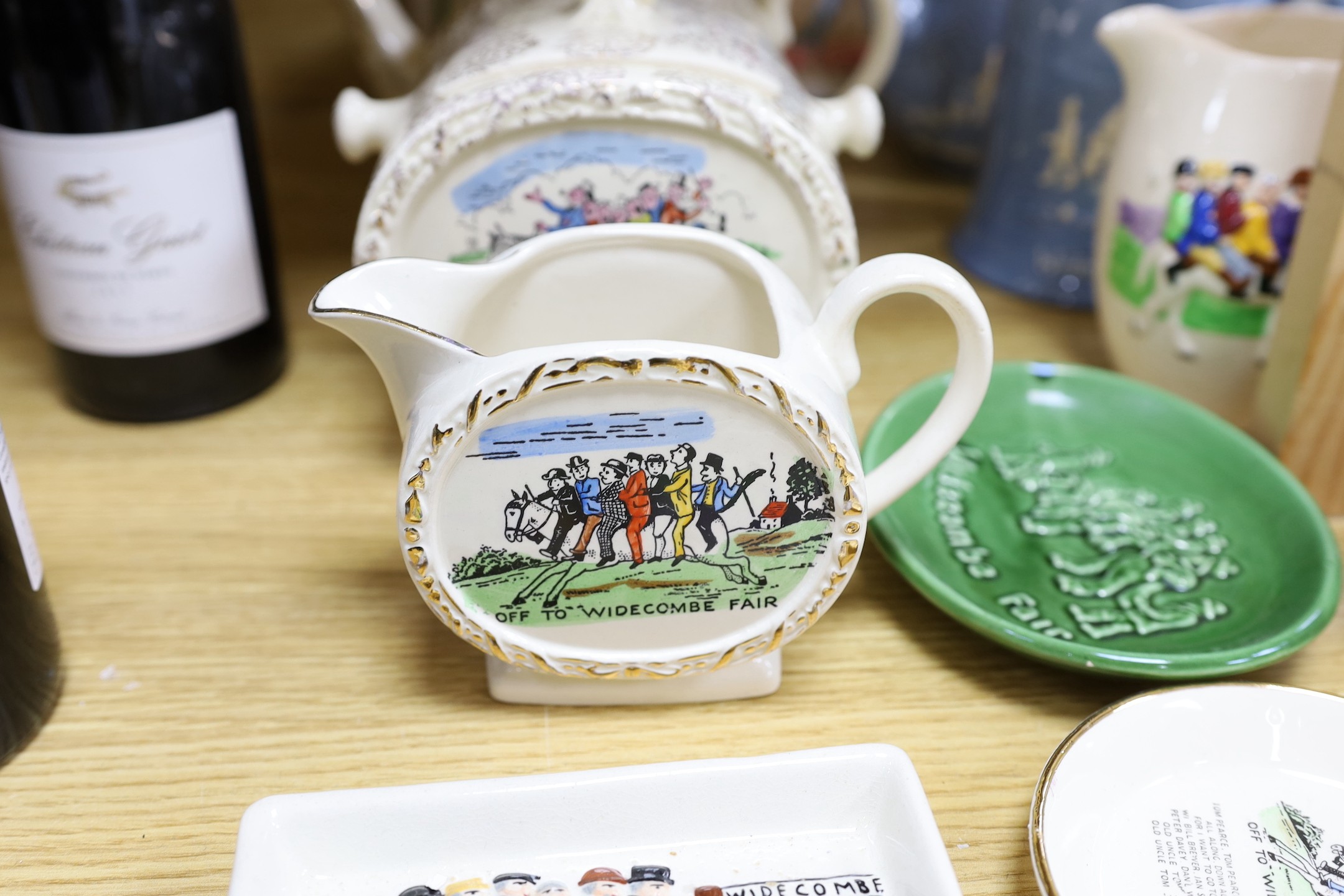 A quantity of novelty items relating to Widecombe Fair, to include jugs, teapots etc.